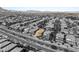 Expansive aerial view showcasing a lovely home in a quiet neighborhood close to major roads at 749 Middle Beach St, Las Vegas, NV 89138