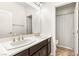 Bathroom featuring a dual sink vanity, modern fixtures and a shower/tub combination at 749 Middle Beach St, Las Vegas, NV 89138