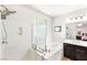 Bright bathroom featuring a soaking tub and glass-enclosed shower at 749 Middle Beach St, Las Vegas, NV 89138