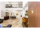 Inviting foyer with soaring ceilings, tile flooring, and views of the dining and living areas at 749 Middle Beach St, Las Vegas, NV 89138