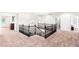 Spacious loft area with carpet flooring and views of the staircase at 749 Middle Beach St, Las Vegas, NV 89138
