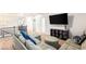Cozy loft with comfortable seating, tv, and views overlooking the home at 749 Middle Beach St, Las Vegas, NV 89138