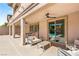Inviting covered patio features comfortable seating, ceiling fans, and access to a sparkling pool at 749 Middle Beach St, Las Vegas, NV 89138