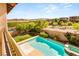 Backyard pool and jacuzzi surrounded by lush landscaping at 749 Middle Beach St, Las Vegas, NV 89138