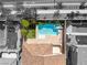 An aerial view of a pristine pool and spa complete with manicured landscaping at 749 Middle Beach St, Las Vegas, NV 89138