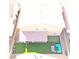 Aerial view of backyard, covered patio, putting green, lounge area, and manicured turf at 7855 Skyler Falls Ln, North Las Vegas, NV 89084