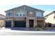 Beautiful two-story home featuring a two-car garage and welcoming front porch at 7855 Skyler Falls Ln, North Las Vegas, NV 89084