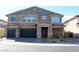 Beautiful two-story home featuring a two-car garage and welcoming front porch at 7855 Skyler Falls Ln, North Las Vegas, NV 89084