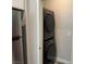 Conveniently located stacked washer and dryer in a modern laundry area at 7855 Skyler Falls Ln, North Las Vegas, NV 89084