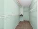 Walk-in closet features carpeted floor and metal shelving with rack for organization at 8733 Country Pines Ave, Las Vegas, NV 89129
