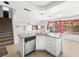 Bright kitchen island featuring granite countertops, stainless steel appliances, and ample cabinet space at 8733 Country Pines Ave, Las Vegas, NV 89129