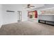 Bright and inviting living room with large window and neutral decor at 8733 Country Pines Ave, Las Vegas, NV 89129