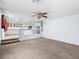 Bright living room that leads to the kitchen, offering an open-concept living space at 8733 Country Pines Ave, Las Vegas, NV 89129