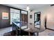 Modern kitchen island featuring a waterfall countertop design and stainless steel finishes at 8925 W Flamingo Rd # 117, Las Vegas, NV 89147
