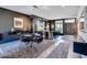 Bright open concept with a dining table near the kitchen with granite countertops and appliances at 8925 W Flamingo Rd # 117, Las Vegas, NV 89147