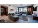 Cozy living room featuring an over-sized sectional, sleek decor, and ample space for relaxing at 8925 W Flamingo Rd # 117, Las Vegas, NV 89147