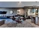 Stylish open concept with the living room, kitchen with stainless steel appliances, and dining table at 8925 W Flamingo Rd # 117, Las Vegas, NV 89147