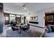 Bright living room featuring modern furnishings and decor, with access to outdoor space at 8925 W Flamingo Rd # 117, Las Vegas, NV 89147