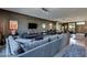 Inviting living area with modern furniture, a large sectional, and stylish decor elements at 8925 W Flamingo Rd # 117, Las Vegas, NV 89147