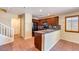 Modern kitchen with granite countertops, stainless steel appliances, and ample cabinet space at 9073 Spoonbill Ridge Pl, Las Vegas, NV 89143