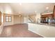 Bright and open living area with a view of the modern kitchen, perfect for entertaining at 9073 Spoonbill Ridge Pl, Las Vegas, NV 89143