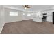 Open living space boasts modern flooring, a ceiling fan, and blends indoor comfort with contemporary design elements at 952 Balzar Ave, Las Vegas, NV 89106