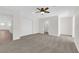 Large bedroom with a ceiling fan, closet space, and an en-suite bathroom at 952 Balzar Ave, Las Vegas, NV 89106