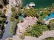 Aerial view featuring a waterfront property with pool and palm trees at 1 Via Mira Monte, Henderson, NV 89011