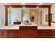 Well-appointed bathroom with a double sink vanity and a large mirror reflecting the bright, inviting space at 1 Via Mira Monte, Henderson, NV 89011