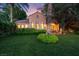 Charming home featuring a lush green lawn, mature landscaping, and covered patio for outdoor enjoyment at 1 Via Mira Monte, Henderson, NV 89011