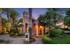 Inviting home exterior with a private walkway, desert landscaping, and unique architectural details at 1 Via Mira Monte, Henderson, NV 89011