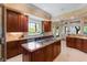 Gourmet kitchen with stainless steel appliances, granite countertops, and ample counter space at 1 Via Mira Monte, Henderson, NV 89011