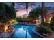 Beautifully landscaped backyard featuring a stunning pool, spa, and lush greenery at 1 Via Mira Monte, Henderson, NV 89011