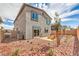 Low maintenance backyard with stone ground cover and patio seating area at 1011 Gentle Swan St # Lot 697, Henderson, NV 89011