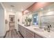 Bathroom featuring a double vanity with modern fixtures and a separate glass shower at 1011 Gentle Swan St # Lot 697, Henderson, NV 89011