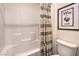 Bathroom features a shower and tub combo, toilet, and stylish decor at 1011 Gentle Swan St # Lot 697, Henderson, NV 89011