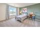 Well-lit bedroom with a large window, desk, and cozy bed, ideal for study and rest at 1011 Gentle Swan St # Lot 697, Henderson, NV 89011