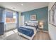 Cozy bedroom with plush bedding, bright natural light, and modern design touches at 1011 Gentle Swan St # Lot 697, Henderson, NV 89011