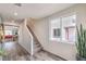 Bright entryway with hardwood floors, a staircase, and a large window at 1011 Gentle Swan St # Lot 697, Henderson, NV 89011