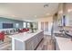 Modern kitchen with a large island flowing into an adjacent living room, perfect for entertaining at 1011 Gentle Swan St # Lot 697, Henderson, NV 89011