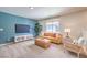 Cozy living room with comfortable seating and entertainment setup for Gathering enjoyment at 1011 Gentle Swan St # Lot 697, Henderson, NV 89011
