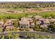 An aerial view of the property showcasing its landscaping and proximity to the golf course at 10301 Orkiney Dr, Las Vegas, NV 89144