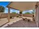 Backyard featuring desert landscaping, a covered patio, and a sitting area at 1104 Aspen Cliff Dr, Henderson, NV 89011