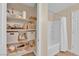 Bathroom with shelving and a tub/shower at 1104 Aspen Cliff Dr, Henderson, NV 89011