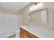 Well-lit bathroom featuring a shower-tub combo and a single sink vanity at 1104 Aspen Cliff Dr, Henderson, NV 89011