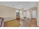 A cozy living space with neutral walls, tile flooring, and natural lighting at 1104 Aspen Cliff Dr, Henderson, NV 89011
