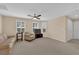 Comfortable living room boasts ample seating and a ceiling fan at 1104 Aspen Cliff Dr, Henderson, NV 89011