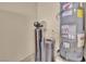 Utility area featuring a water heater, water filtration system, and basic utilities, ensuring home efficiency at 1104 Aspen Cliff Dr, Henderson, NV 89011