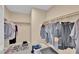 Spacious walk-in closet with clothing racks and shelves at 1104 Aspen Cliff Dr, Henderson, NV 89011