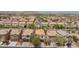 An aerial view shows the neighborhood's well-maintained homes, mature trees and quiet streets at 11221 Victoria Medici St, Las Vegas, NV 89141